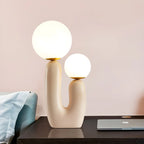 Lampe de table en verre globe cactus en résine rose