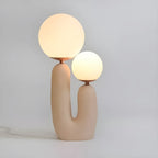Lampe de table en verre globe cactus en résine rose