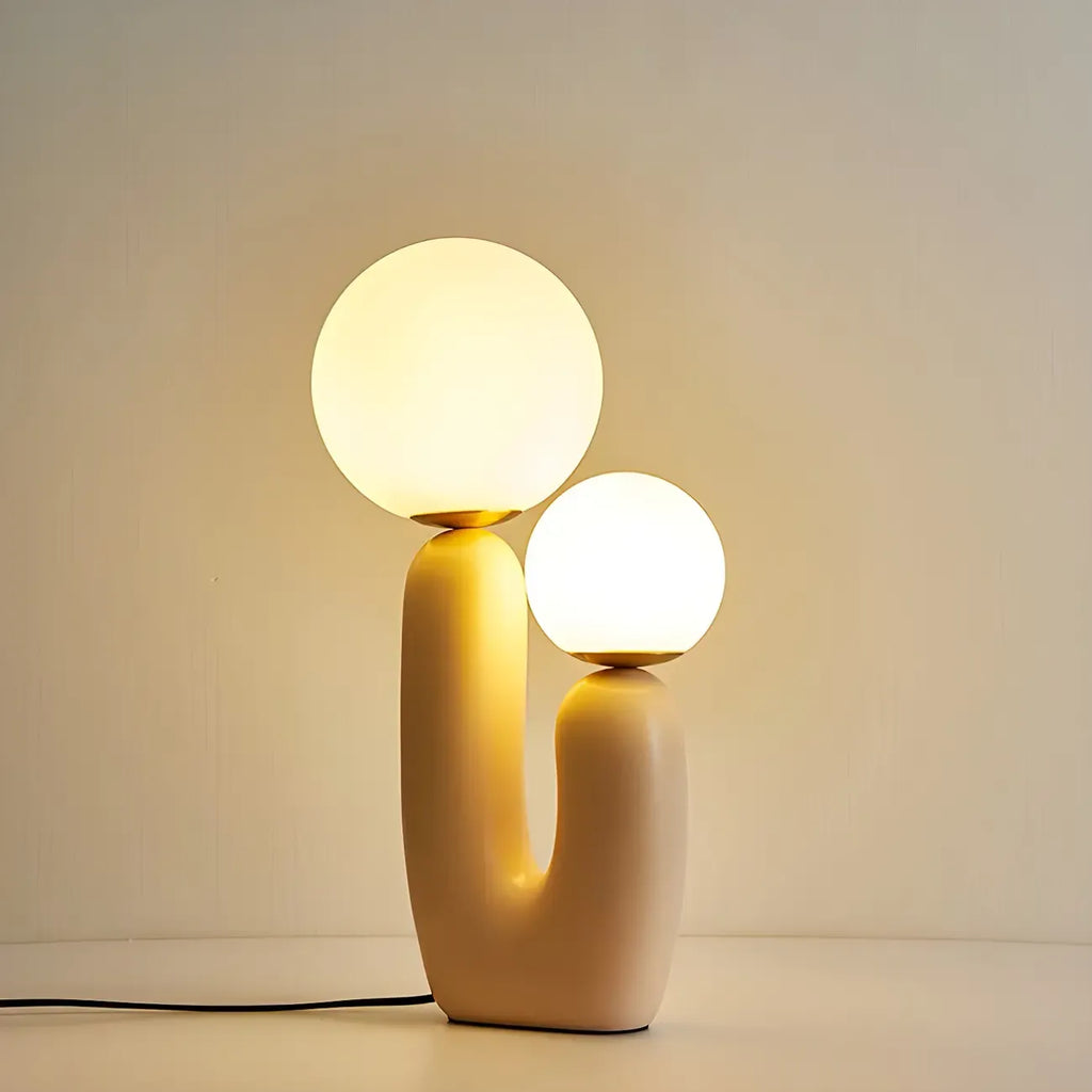 Lampe de table en verre globe cactus en résine rose