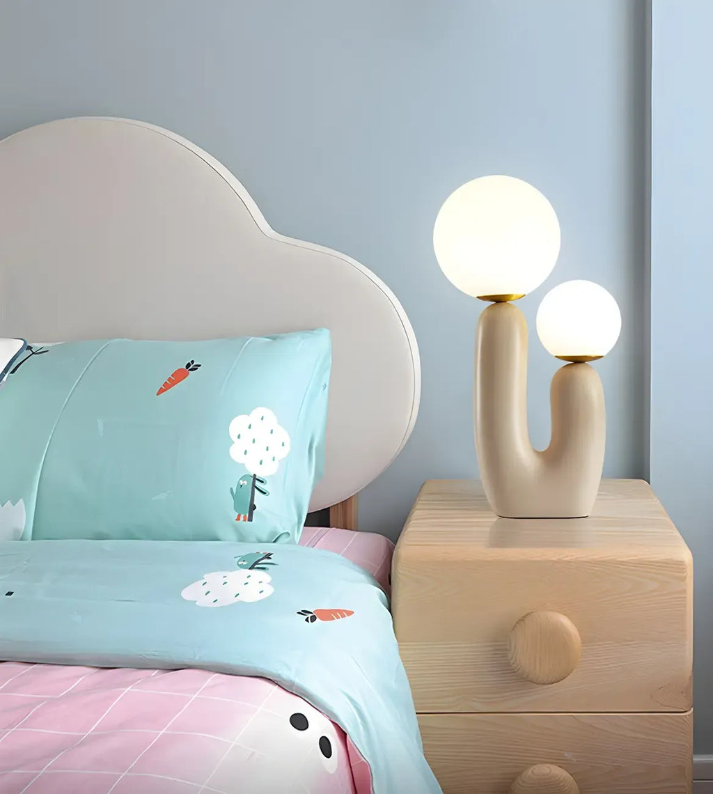 Lampe de table en verre globe cactus en résine rose