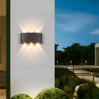 Applique murale extérieure moderne en métal noir à LED (éclairage vers le haut et vers le bas)