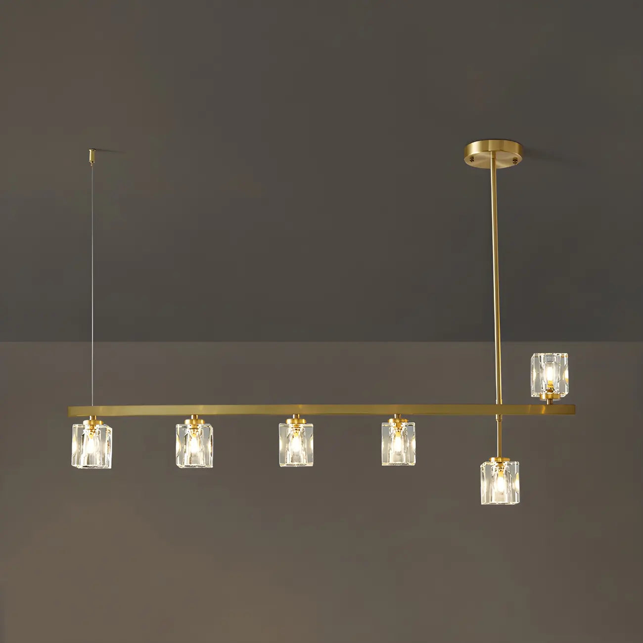 Suspension linéaire géométrique en cristal doré pour îlot lumineux
