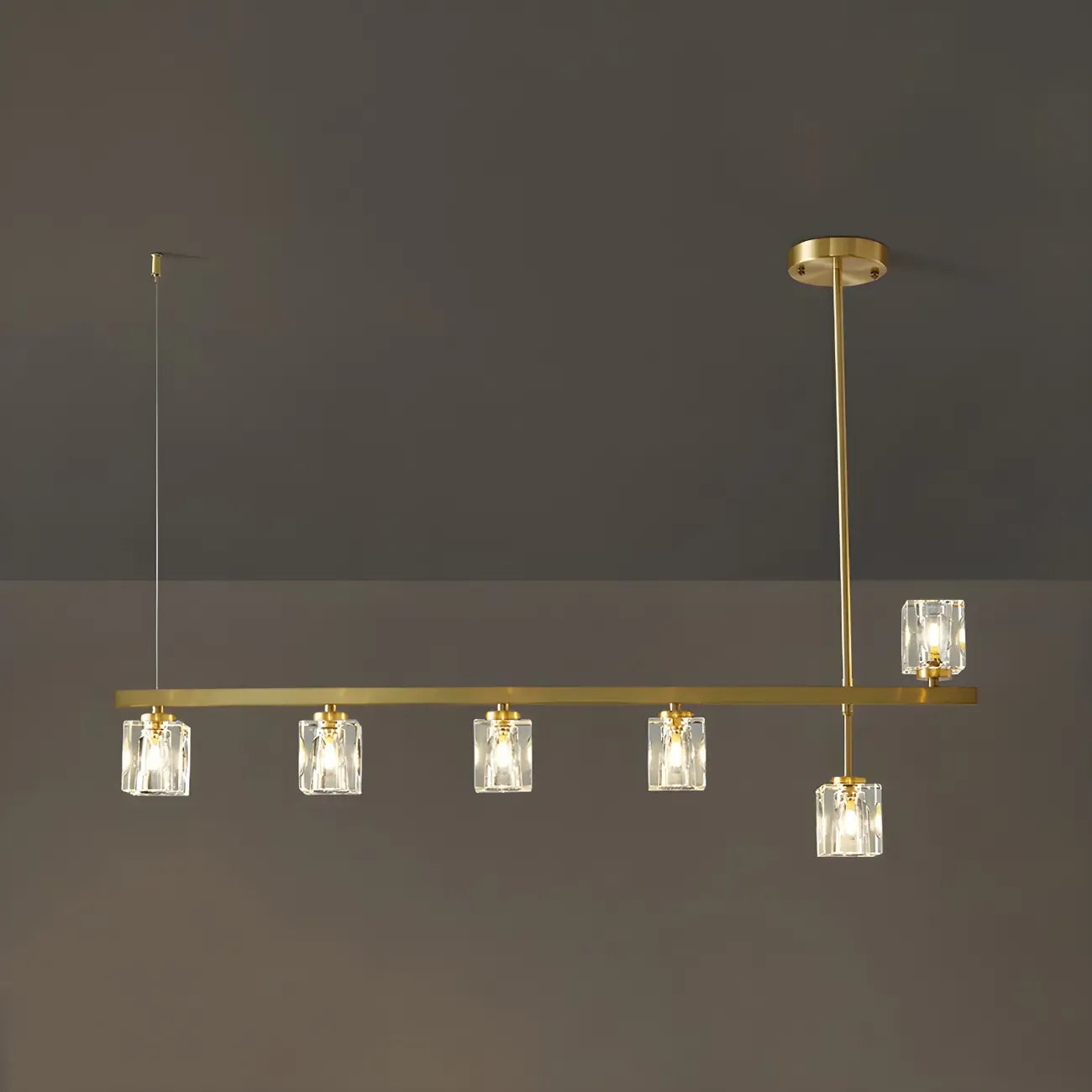 Suspension linéaire géométrique en cristal doré pour îlot lumineux