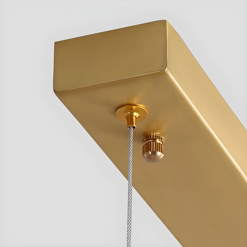 Suspension linéaire géométrique en cristal doré pour îlot lumineux
