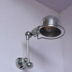 Applique murale mini bras articulé en métal argenté brillant de style industriel