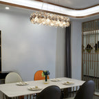 Lustre ovale moderne exquis en cristal doré pour îlot central