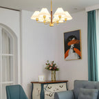 Lustre moderne plissé linéaire en métal doré