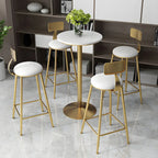 Table de bar élégante en marbre nordique avec piètement en métal doré