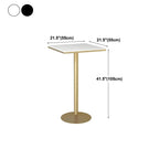 Table de bar élégante en marbre nordique avec piètement en métal doré
