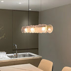 Lampada a sospensione lineare regolabile dorata in vetro per cucine