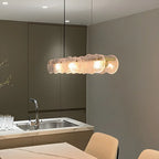 Lampada a sospensione lineare regolabile dorata in vetro per cucine
