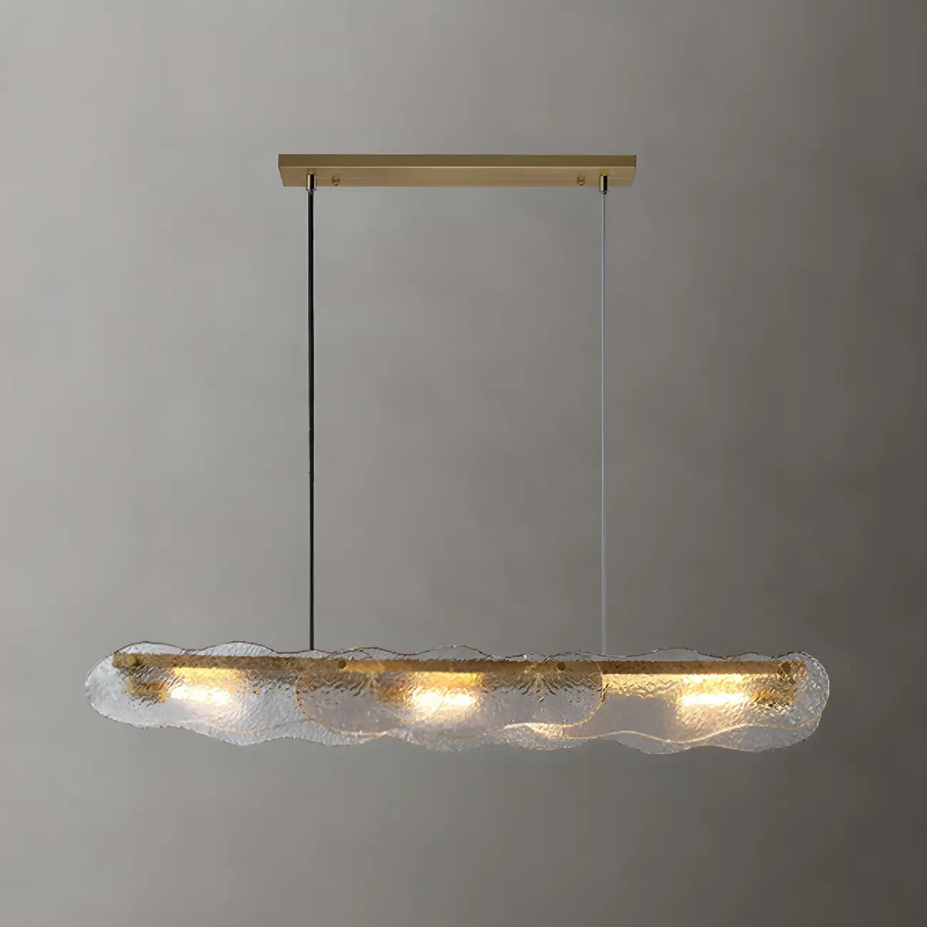 Lampada a sospensione lineare regolabile dorata in vetro per cucine