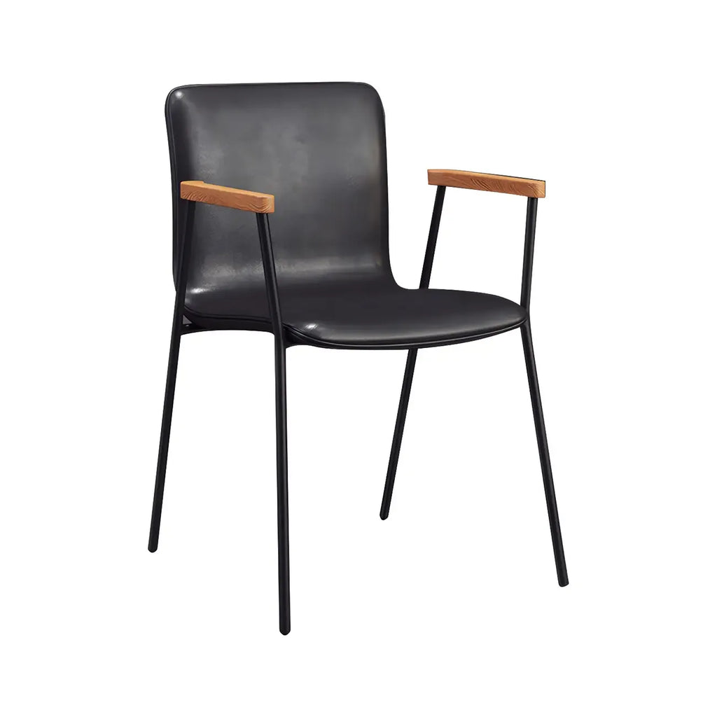 Chaise de salle à manger en cuir avec pieds en métal, accoudoirs et dossier.