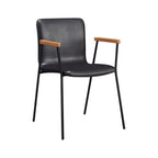 Chaise de salle à manger en cuir avec pieds en métal, accoudoirs et dossier.
