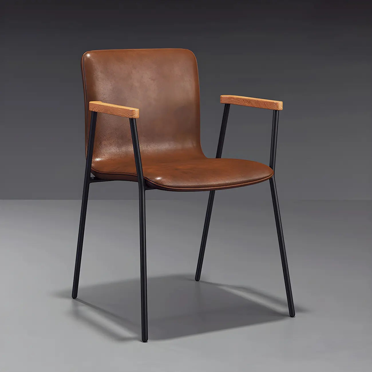 Chaise de salle à manger en cuir avec pieds en métal, accoudoirs et dossier.