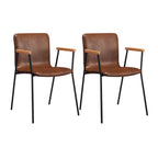 Chaise de salle à manger en cuir avec pieds en métal, accoudoirs et dossier.