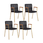 Chaise de salle à manger en cuir avec pieds en métal, accoudoirs et dossier.