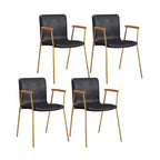 Chaise de salle à manger en cuir avec pieds en métal, accoudoirs et dossier.