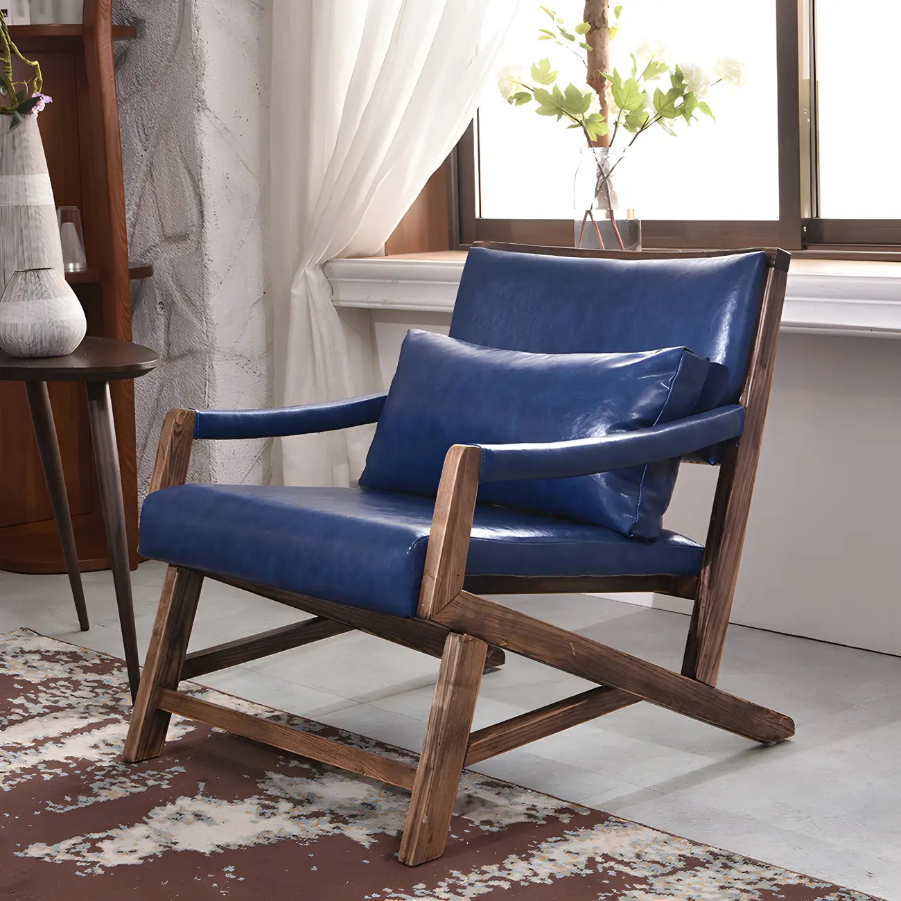 Fauteuil lounge moderne en similicuir avec dossier coussin