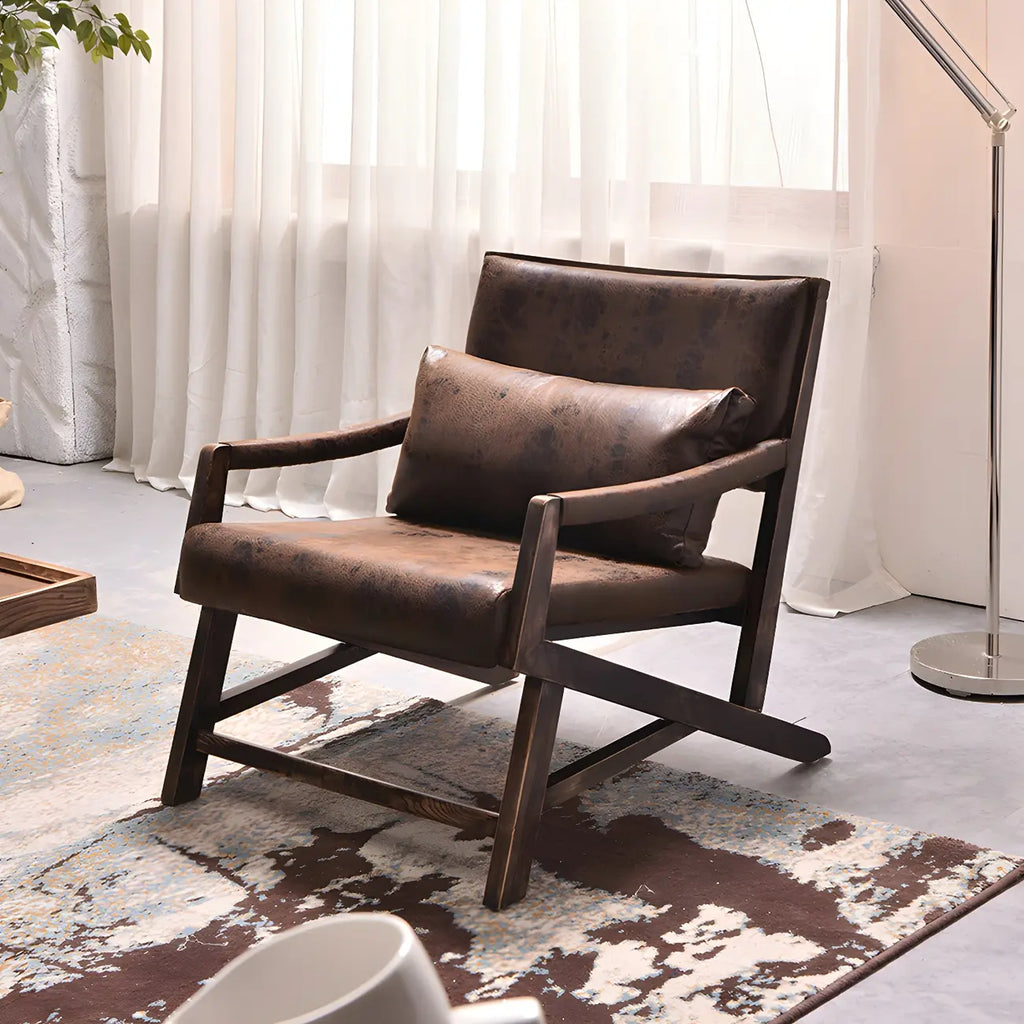 Fauteuil lounge moderne en similicuir avec dossier coussin