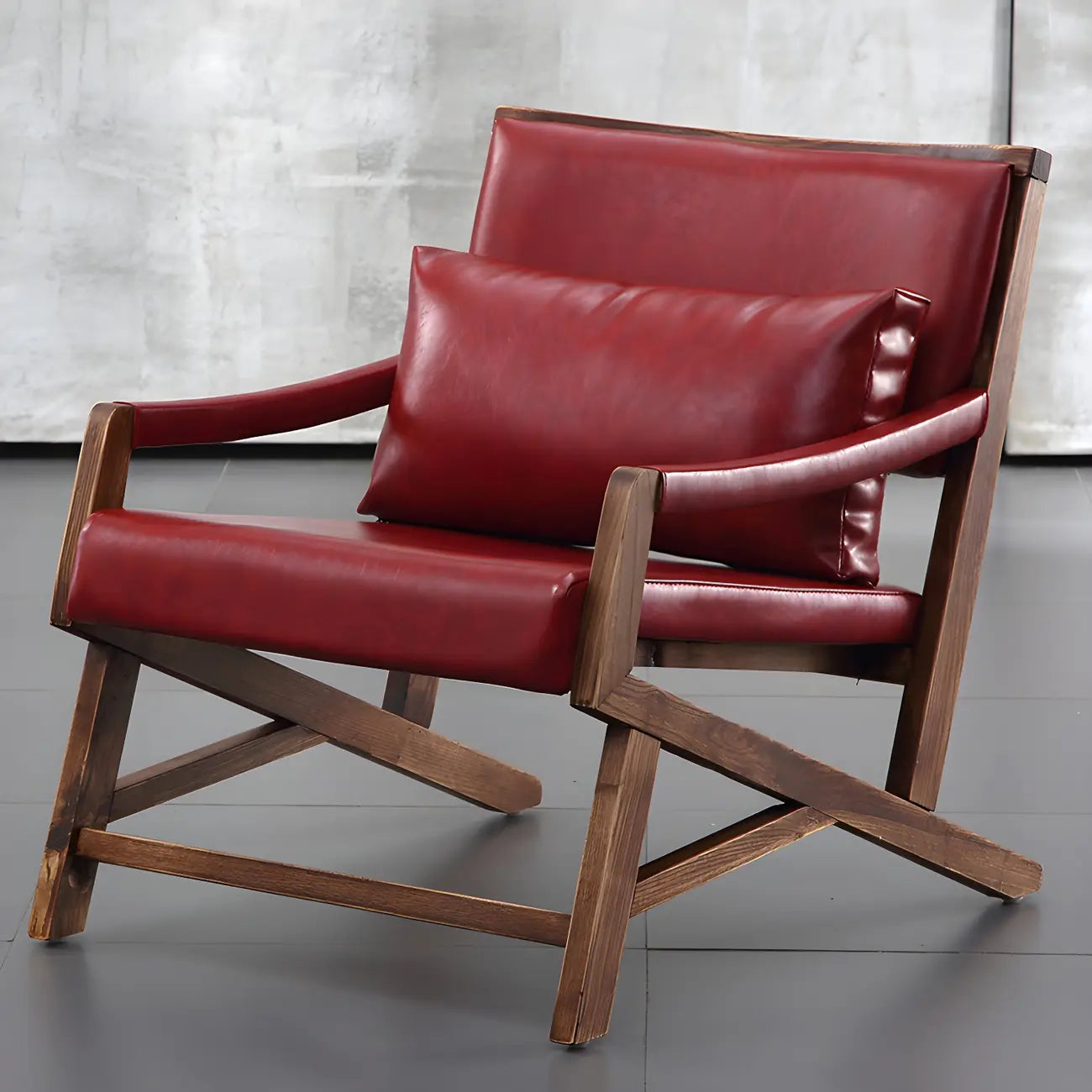 Fauteuil lounge moderne en similicuir avec dossier coussin