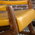 Fauteuil lounge moderne en similicuir avec dossier coussin