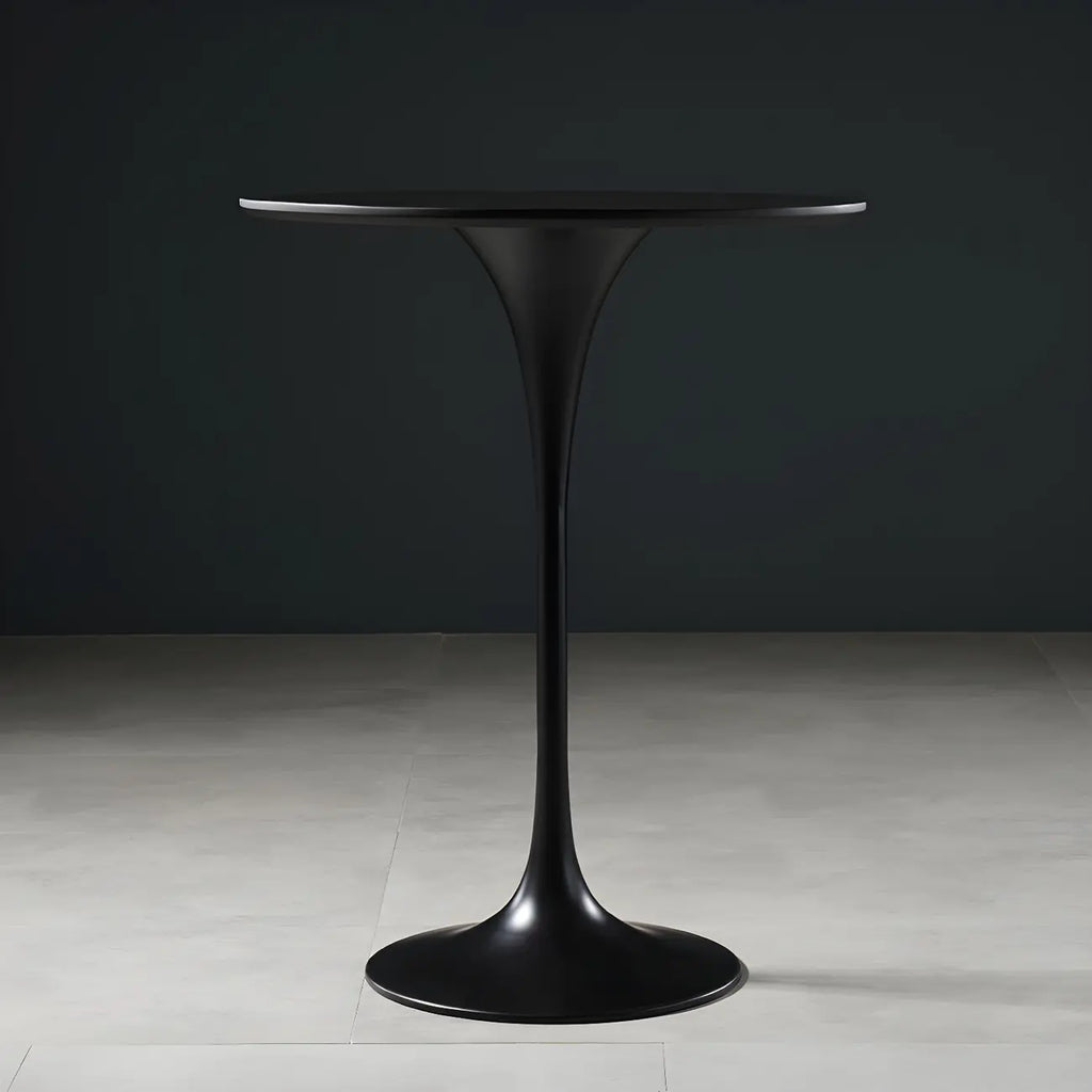 Table de bar ronde et haute de style bistro, avec pied central.