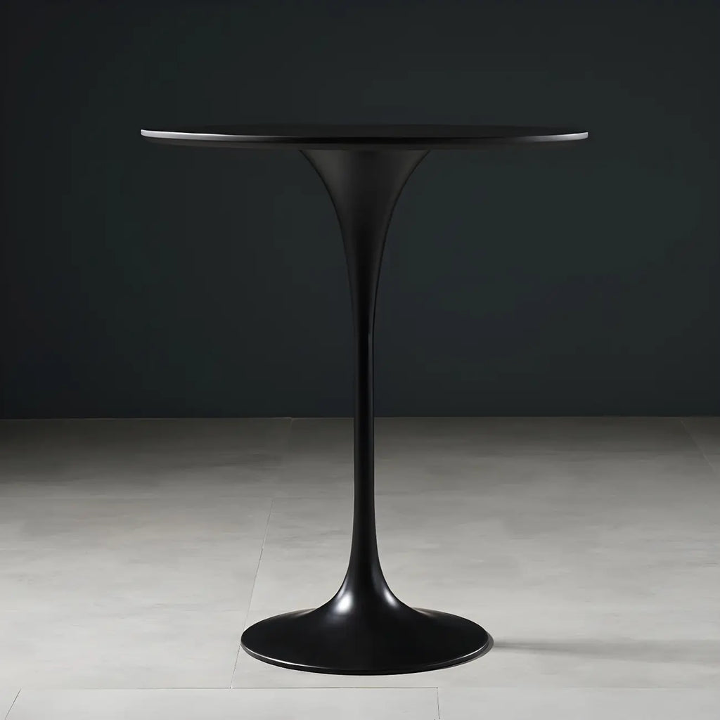 Table de bar ronde et haute de style bistro, avec pied central.