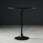 Table de bar ronde et haute de style bistro, avec pied central.