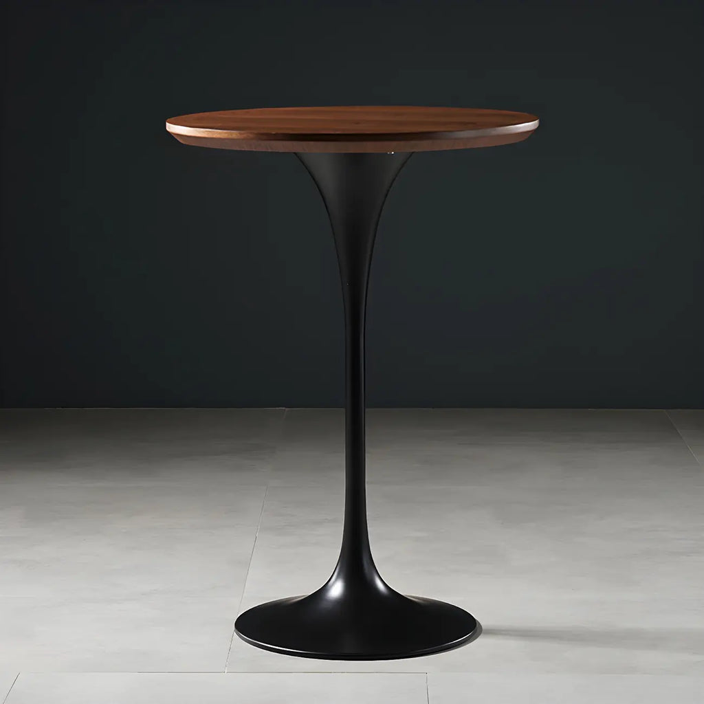 Table de bar ronde et haute de style bistro, avec pied central.