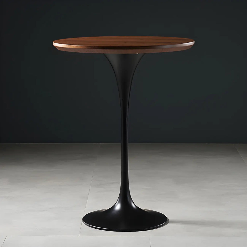 Table de bar ronde et haute de style bistro, avec pied central.