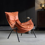 Fauteuil lounge moderne en tissu vert avec assise rembourrée