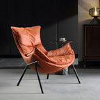 Fauteuil lounge moderne en tissu vert avec assise rembourrée