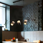 Suspension cylindrique noire moderne pour cuisine