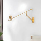 Applique murale à bras articulé avec abat-jour cylindrique en métal doré