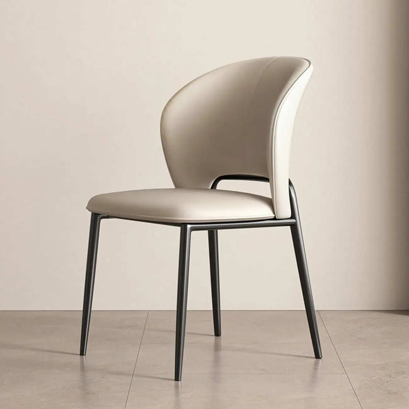 Chaise de salle à manger moderne en similicuir à dossier bas incurvé