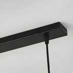 Suspension industrielle noire à plusieurs lumières