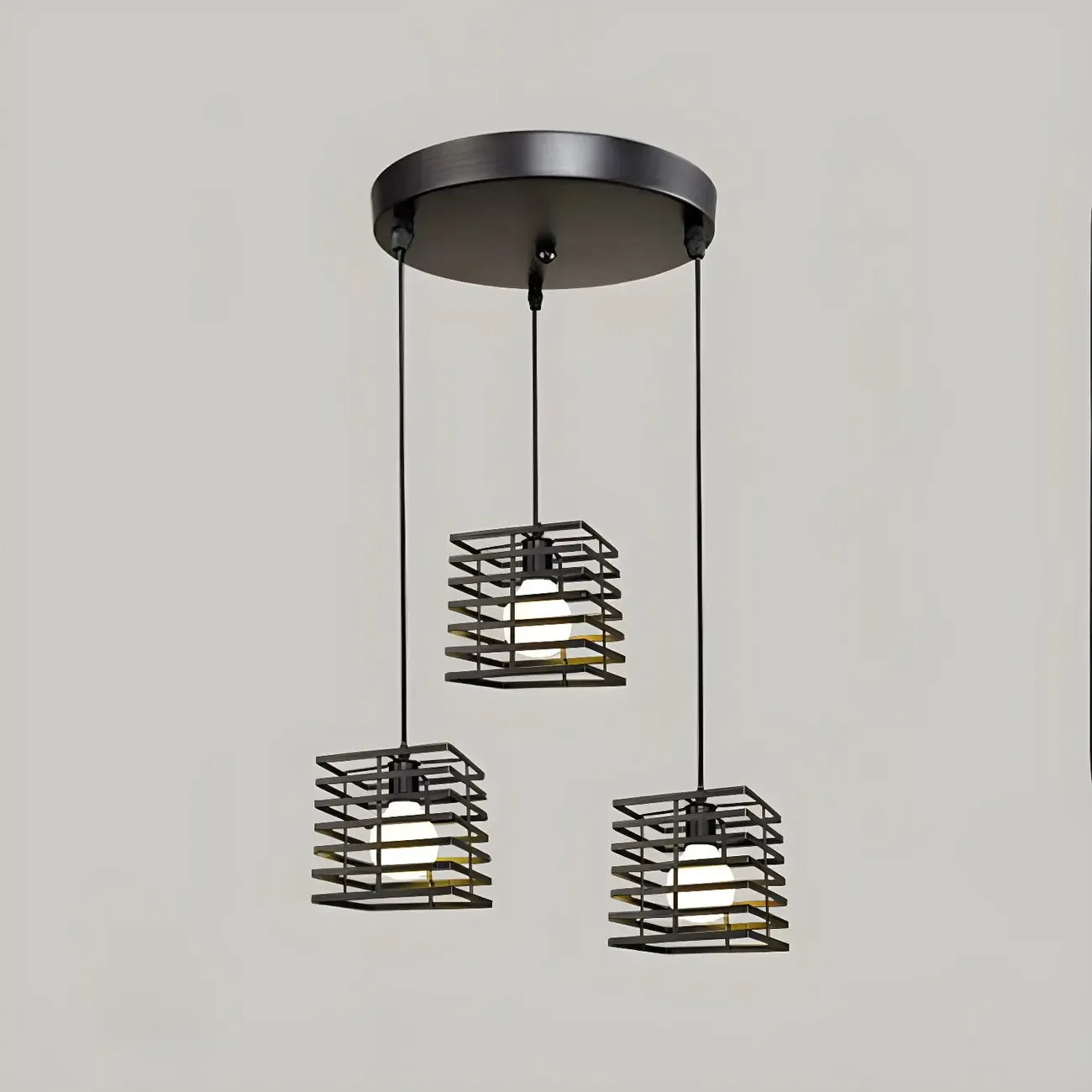 Suspension lanterne industrielle noire à 3 lumières