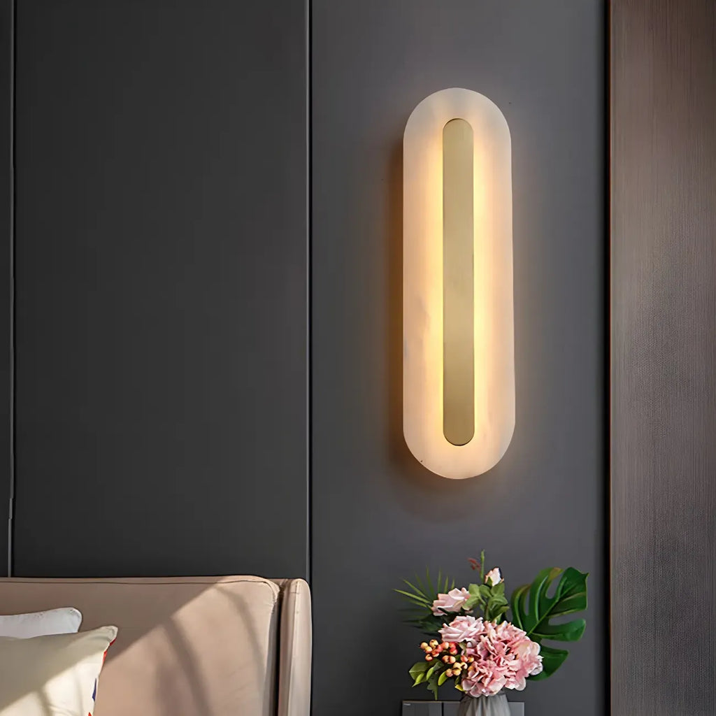 Applique murale ovale moderne en laiton et pierre avec LED à intensité variable pour chambre à coucher