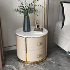 Table de chevet ronde glamour en cuir avec plateau en marbre et 2 tiroirs