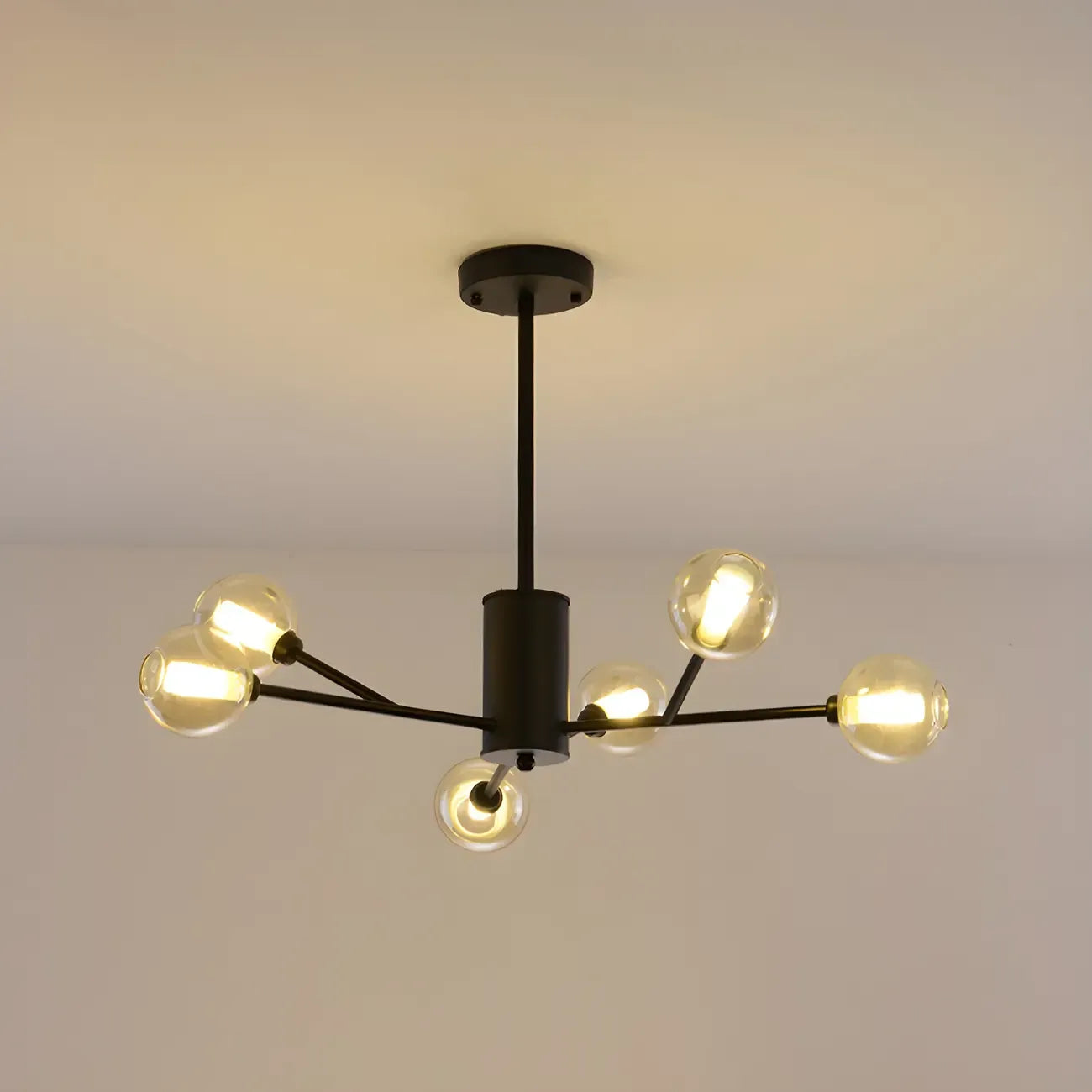 Lustre Sputnik moderne en métal doré et globe en verre
