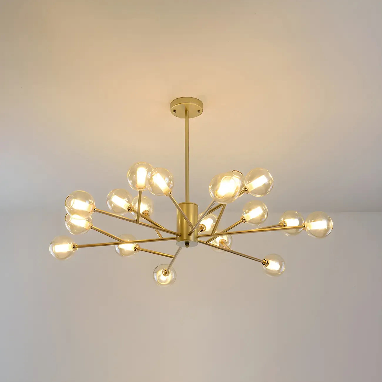 Lustre Sputnik moderne en métal doré et globe en verre