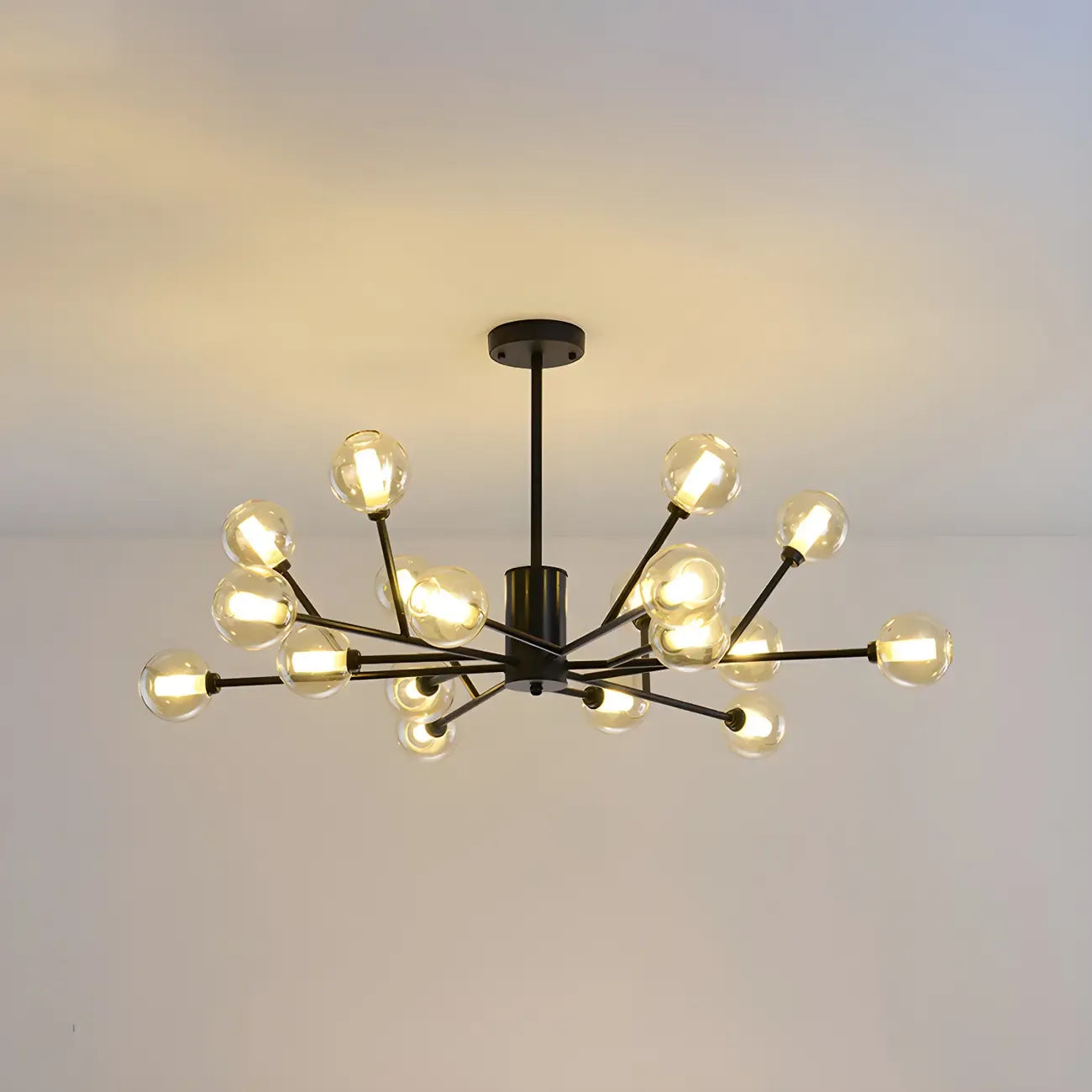 Lustre Sputnik moderne en métal doré et globe en verre