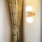Applique murale moderne dorée à double globe en verre pour salle de bain