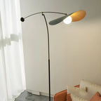 Lampadaire arqué en métal noir artistique de 73 pouces avec bras oscillant