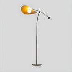 Lampadaire arqué en métal noir artistique de 73 pouces avec bras oscillant