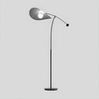 Lampadaire arqué en métal noir artistique de 73 pouces avec bras oscillant