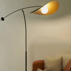 Lampadaire arqué en métal noir artistique de 73 pouces avec bras oscillant