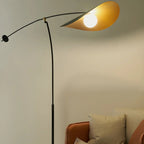 Lampadaire arqué en métal noir artistique de 73 pouces avec bras oscillant