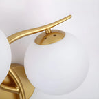Applique murale double en verre torsadé doré moderne avec globe lumineux